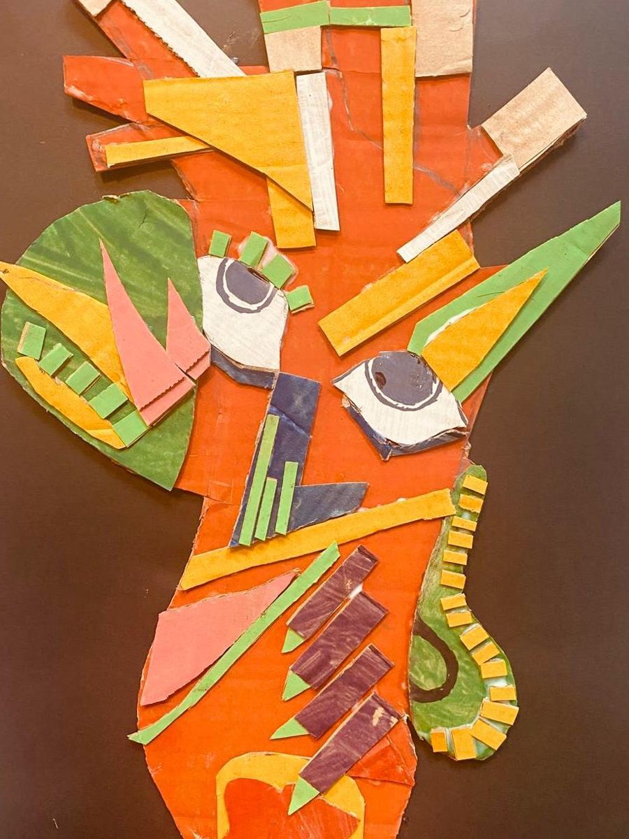 A Picasso-style cardboard face collage